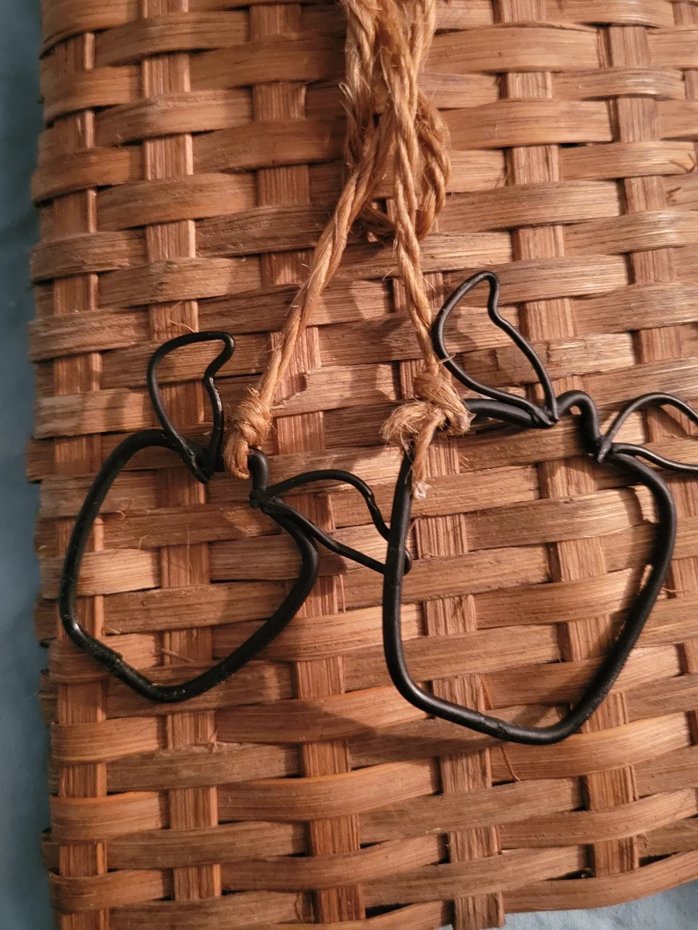 Rustic Black Metal Apple Wall Hook with Woven Basket Accent